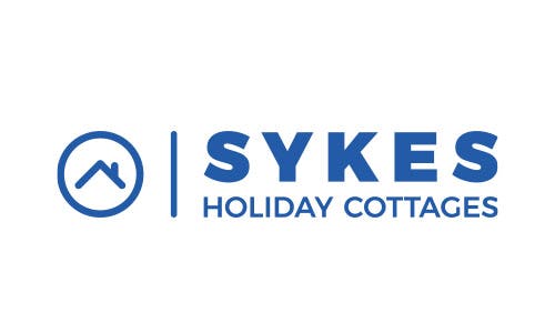 The logo for Sykes Holiday Cottages
